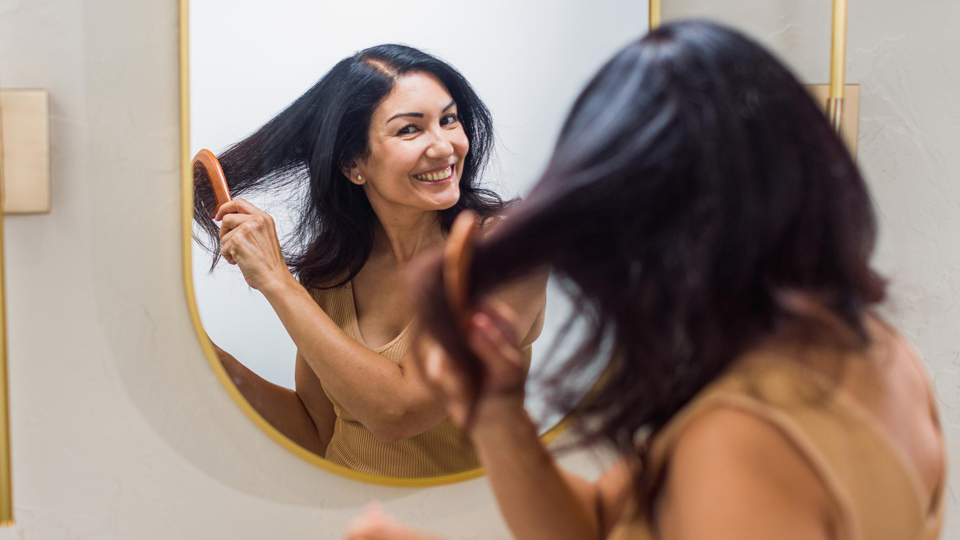 Best tips for your hair, woman brushing hair