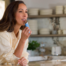 Healthy snacking options, woman eating snack bite