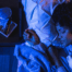 Menopausal woman sleeping in her bed.