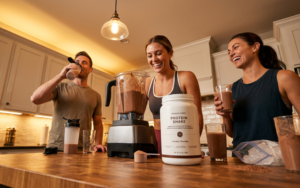 Healthy people enjoying Isagenix shakes with MCT oil.